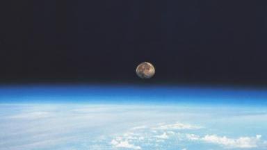 File:Moon suspended over the atmosphere 384x216.jpg