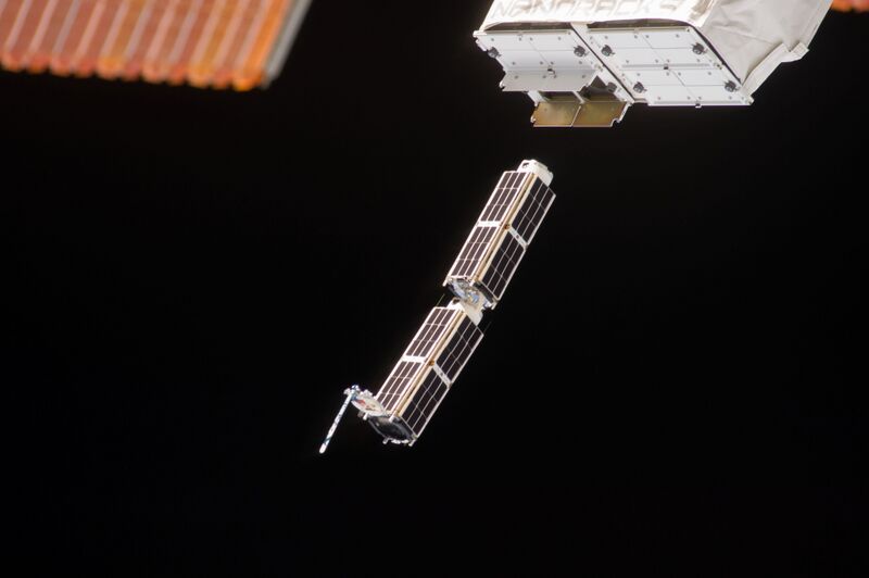 File:Doves close-up-of-cubesats-leaving-nanoracks-deployer-2014-02-11.jpg